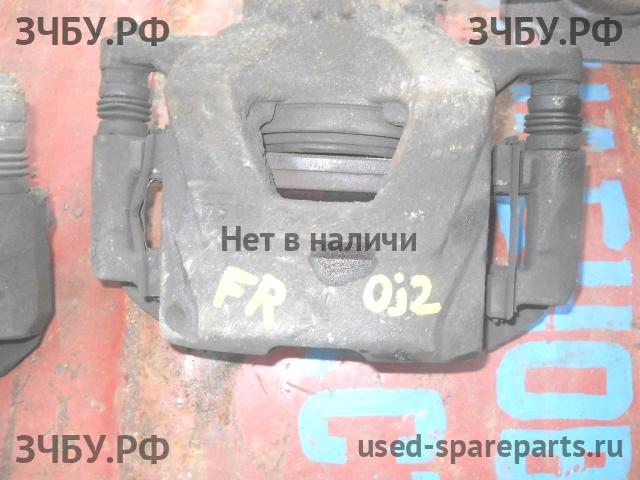Opel Astra J Суппорт передний правый (в сборе со скобой)