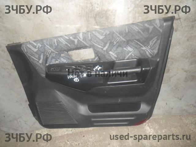 Mitsubishi Pajero Pinin (H60) Обшивка двери передней правой