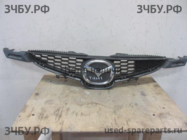 Mazda 2 [DE] Решетка радиатора