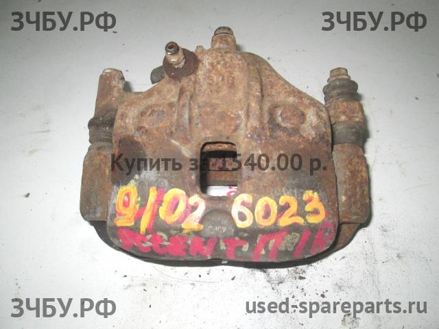 Hyundai Accent 2 Суппорт передний правый (в сборе со скобой)