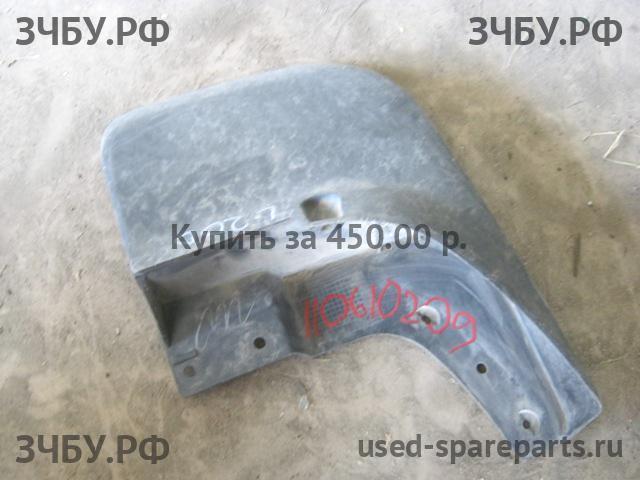 Mitsubishi L200 (4)[KB] Брызговик задний левый