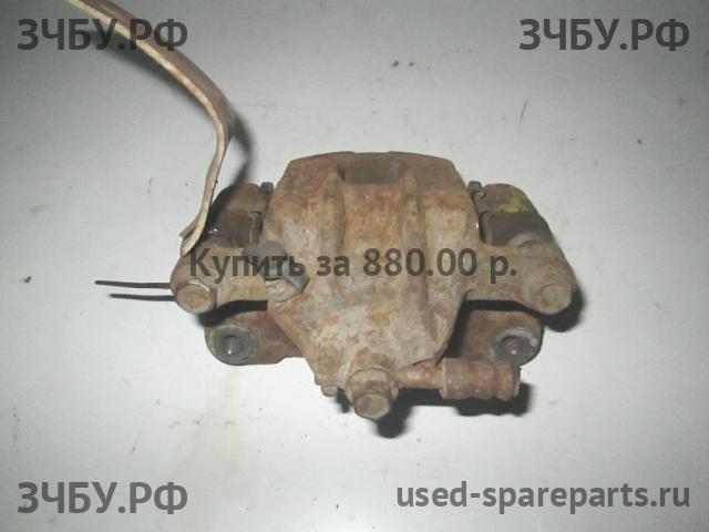 Hyundai Santa Fe 1 (SM) Суппорт задний левый (в сборе со скобой)