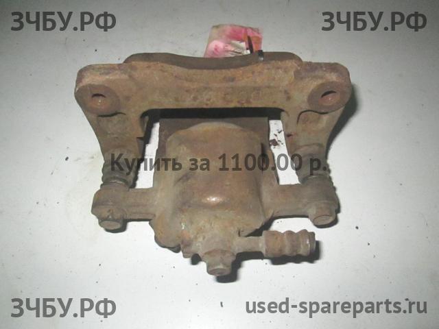 Hyundai Santa Fe 1 (SM) Суппорт задний правый (в сборе со скобой)