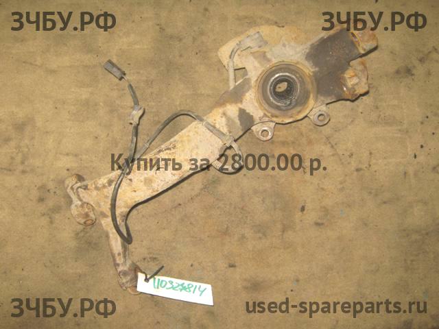 Volkswagen Passat B5 Кулак поворотный передний левый (со ступицей)