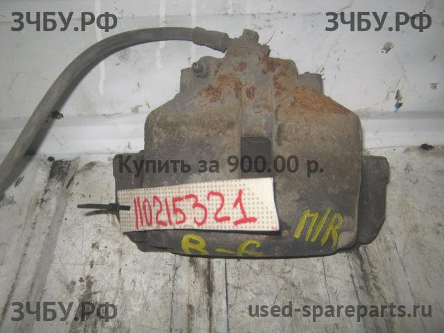 Volkswagen Passat B6 Суппорт передний правый (в сборе со скобой)