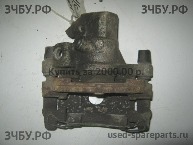 Mazda 3 [BK] Суппорт задний правый (в сборе со скобой)