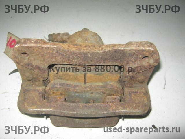 Hyundai Santa Fe 1 (SM) Суппорт задний правый (в сборе со скобой)