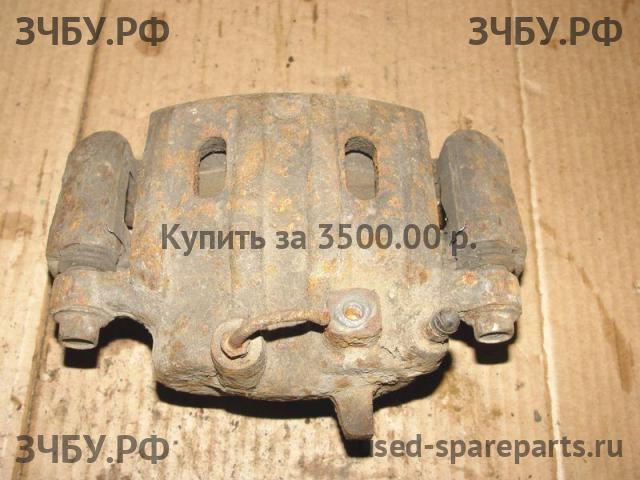 Mitsubishi Pajero/Montero 2 Суппорт передний левый (в сборе со скобой)