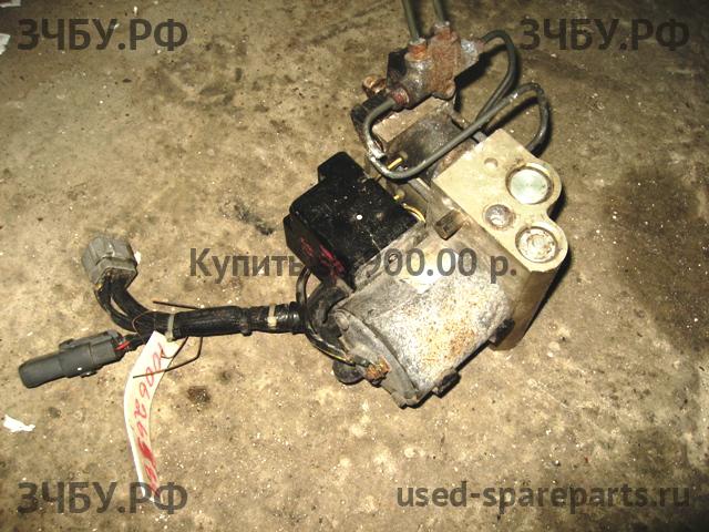 Mazda 929 [HC] Блок ABS (насос)