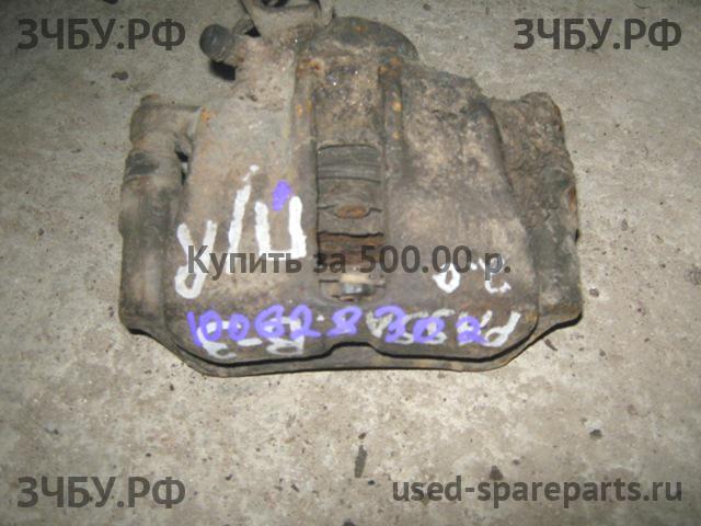 Volkswagen Passat B3 Суппорт передний правый (в сборе со скобой)