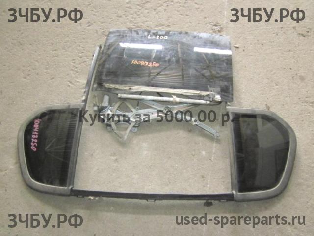 Mitsubishi L200 (4)[KB] Стекло заднее