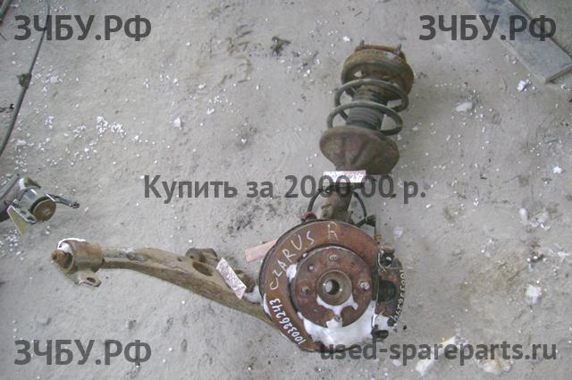 KIA Clarus Кулак поворотный передний правый (со ступицей)