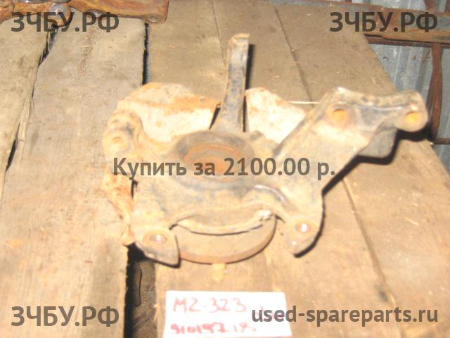Mazda 323 [BG] Кулак поворотный передний левый (со ступицей)