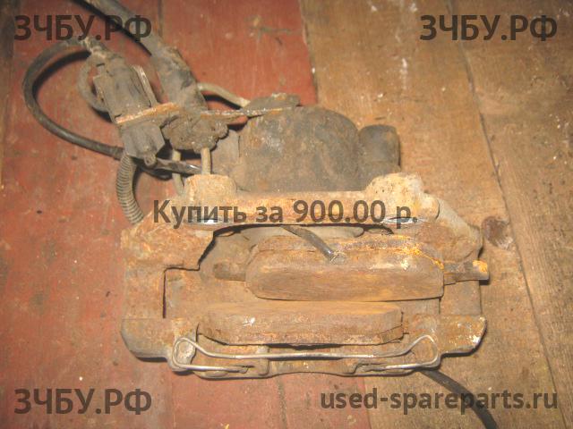 Volkswagen Passat B5 Суппорт передний правый (в сборе со скобой)