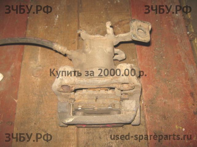 Toyota Auris 1 (E150) Суппорт задний правый (в сборе со скобой)