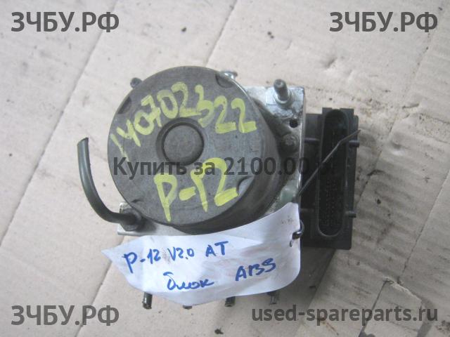 Nissan Primera P12 Блок ABS (насос)