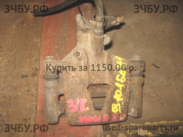 Ford Mondeo 3 Суппорт задний левый (в сборе со скобой)