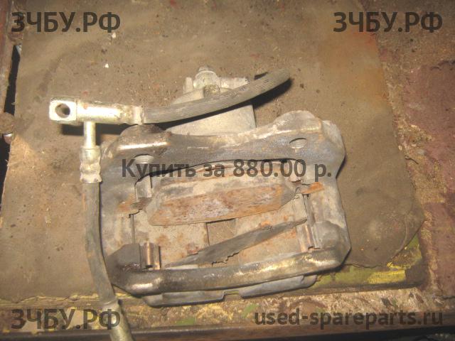 Nissan Primera P12 Суппорт передний правый (в сборе со скобой)
