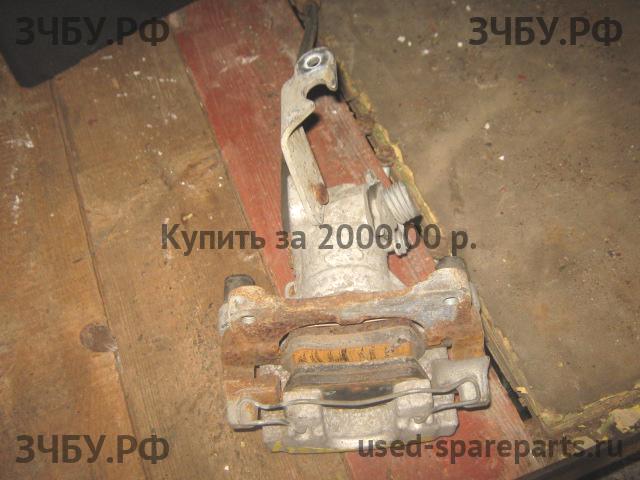 Nissan Primera P12 Суппорт задний левый (в сборе со скобой)