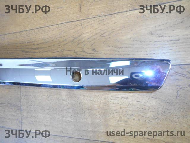 Toyota Corolla (E14 - E15) Накладка на крышку багажника