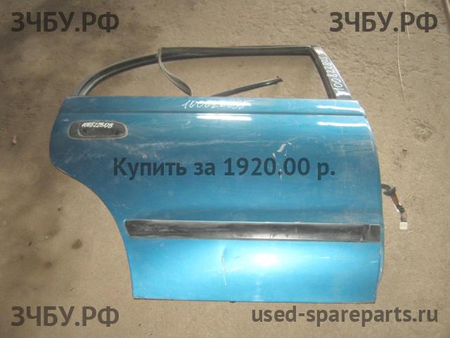 Toyota Carina.E (T190) Дверь задняя правая