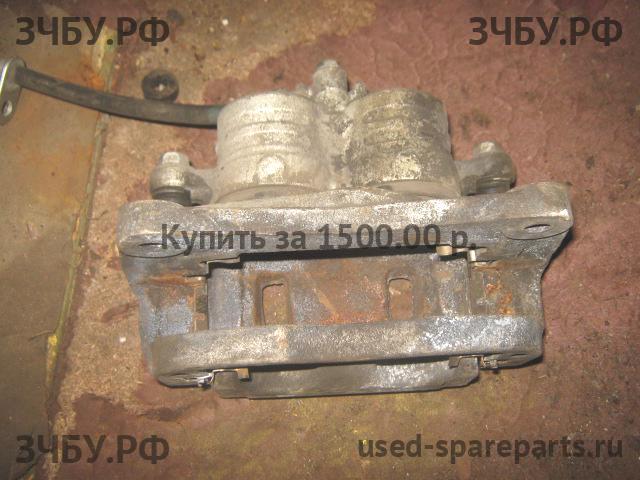 Subaru Impreza 2 (G11) Суппорт передний правый (в сборе со скобой)
