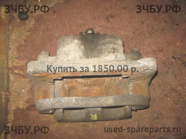 Subaru Impreza 2 (G11) Суппорт передний правый (в сборе со скобой)
