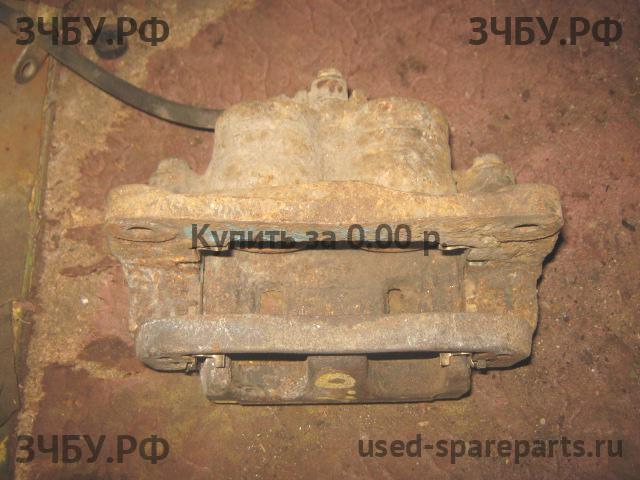 Subaru Impreza 2 (G11) Суппорт передний правый (в сборе со скобой)