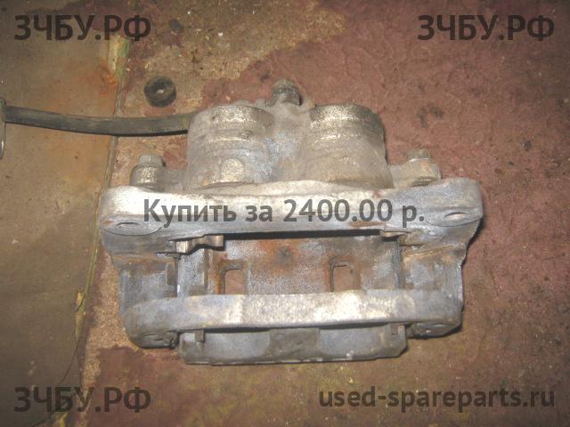 Subaru Forester 2 (S11) Суппорт передний правый (в сборе со скобой)