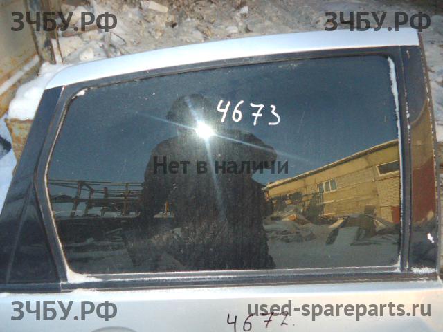 Ford Focus 1 Стекло двери задней правой