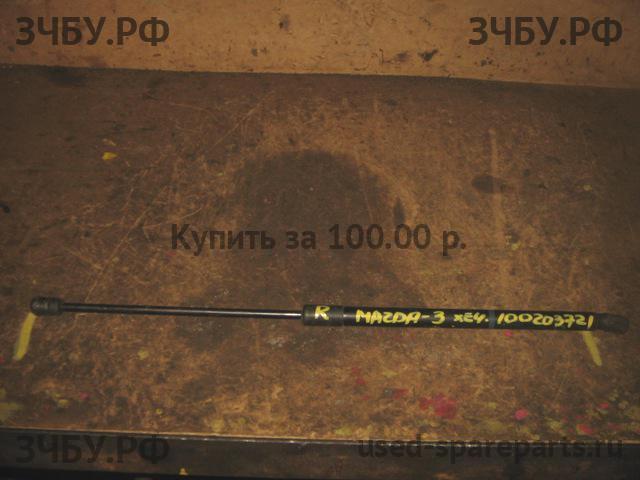 Mazda 3 [BK] Амортизатор крышки багажника