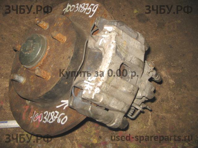 Nissan Primera P12 Суппорт задний правый (в сборе со скобой)