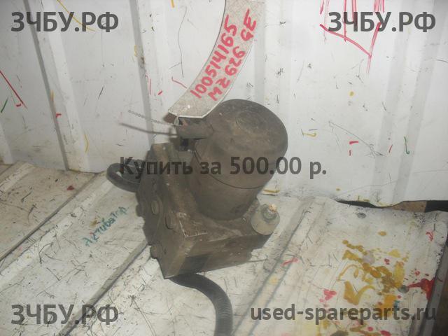 Mazda 626 [GE] Блок ABS (насос)