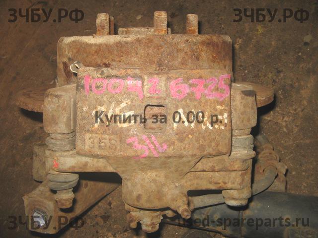 Toyota Corona EXIV Суппорт задний левый (в сборе со скобой)