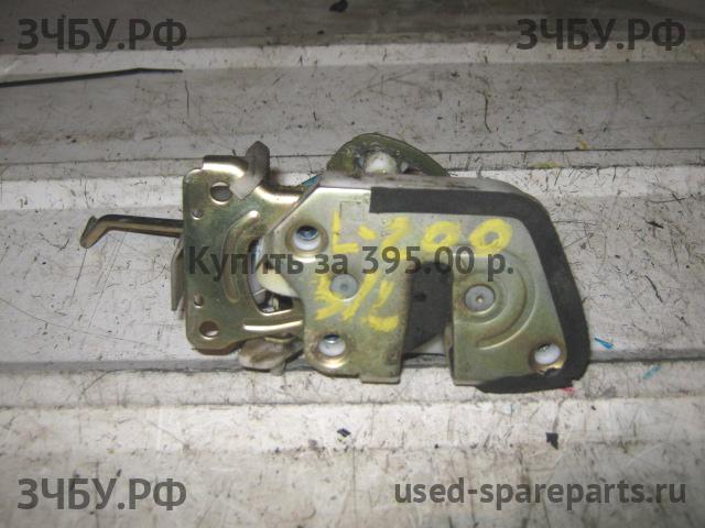 Mitsubishi L200 (3)[K6;K7] Замок двери задней левой