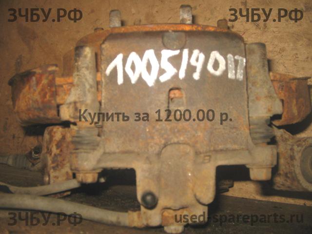 Mitsubishi Pajero/Montero 3 Суппорт задний правый (в сборе со скобой)