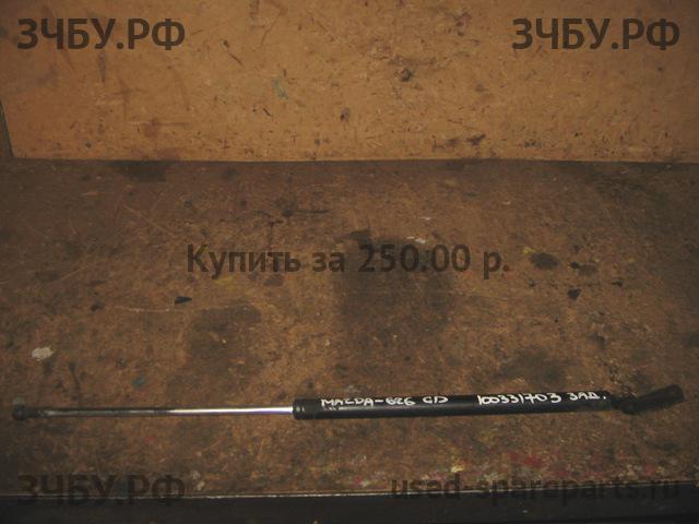 Mazda 626 [GD] Амортизатор крышки багажника