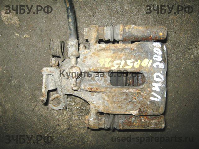 Volvo V40 (1) Суппорт задний правый (в сборе со скобой)