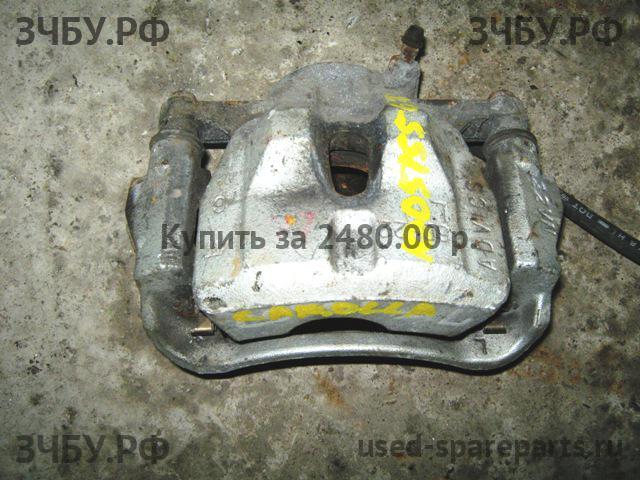 Toyota Corolla (E14 - E15) Суппорт передний левый (в сборе со скобой)