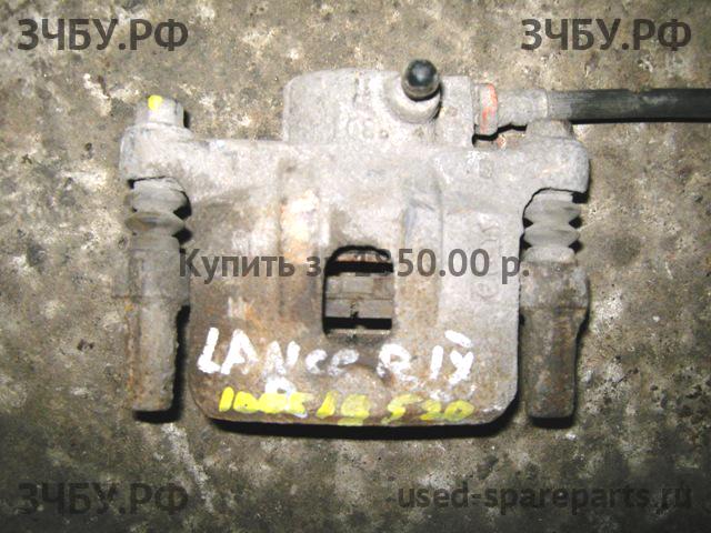 Mitsubishi Lancer 9 [CS/Classic] Суппорт передний правый (в сборе со скобой)