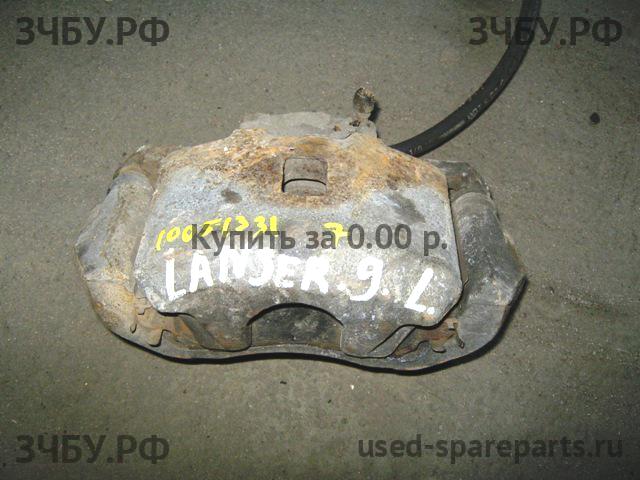 Mitsubishi Lancer 9 [CS/Classic] Суппорт передний левый (в сборе со скобой)