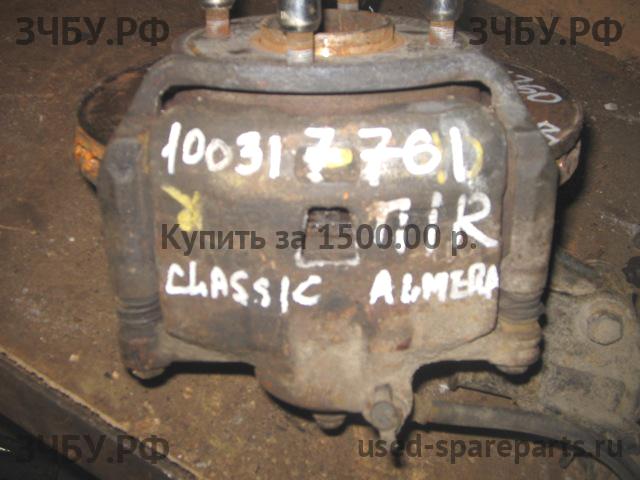 Nissan Almera Classic Суппорт передний правый (в сборе со скобой)