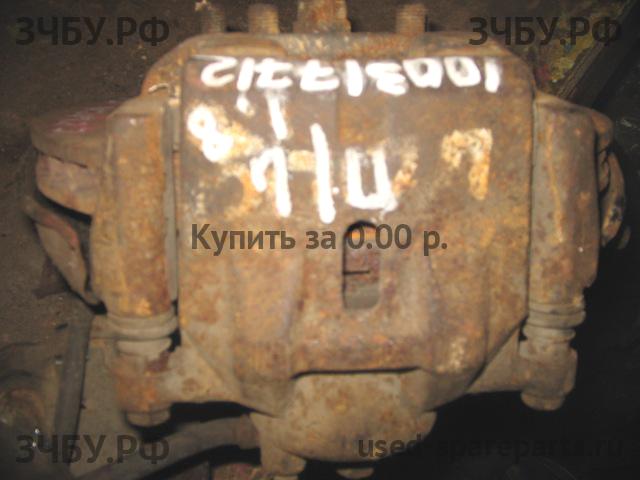 Toyota Celica (T23) Суппорт передний левый (в сборе со скобой)