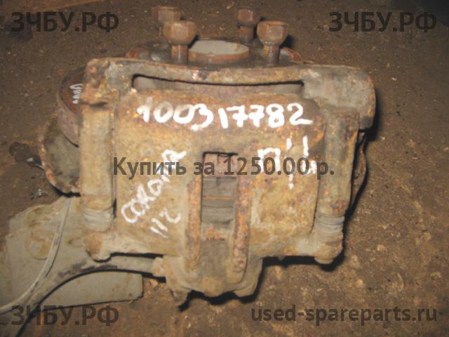Toyota Corolla (E12) Суппорт передний левый (в сборе со скобой)