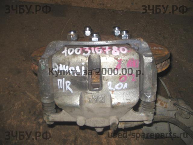 Nissan Qashqai+2 (JJ10) Суппорт передний правый (в сборе со скобой)