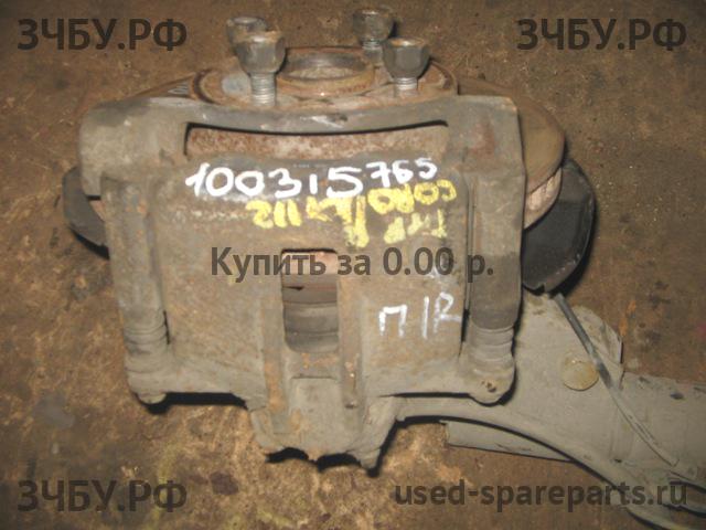 Toyota Corolla (E12) Суппорт передний правый (в сборе со скобой)
