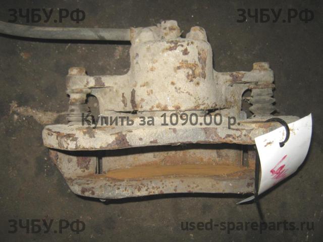 Mitsubishi Lancer 9 [CS/Classic] Суппорт передний левый (в сборе со скобой)