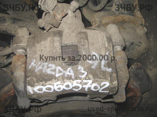 Mazda 3 [BK] Суппорт задний левый (в сборе со скобой)