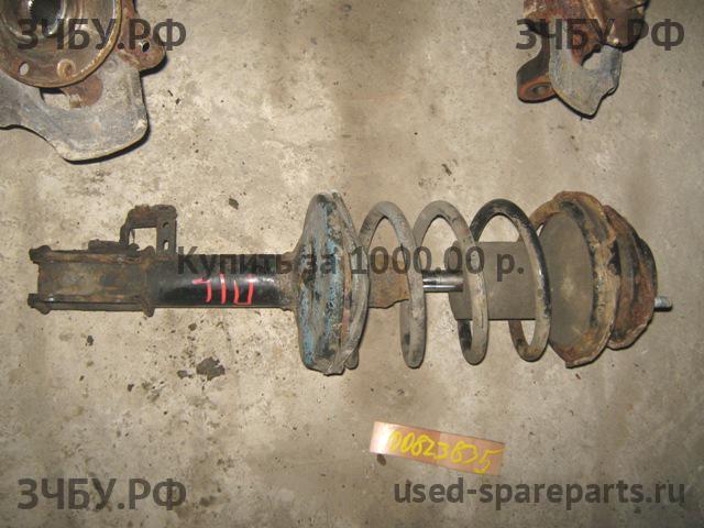Toyota Carina.E (T190) Стойка передняя левая (в сборе)