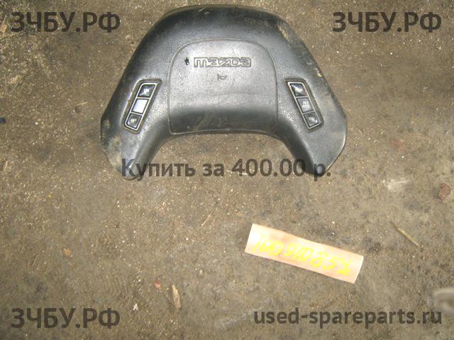 Mazda Navajo Накладка звукового сигнала (в руле)